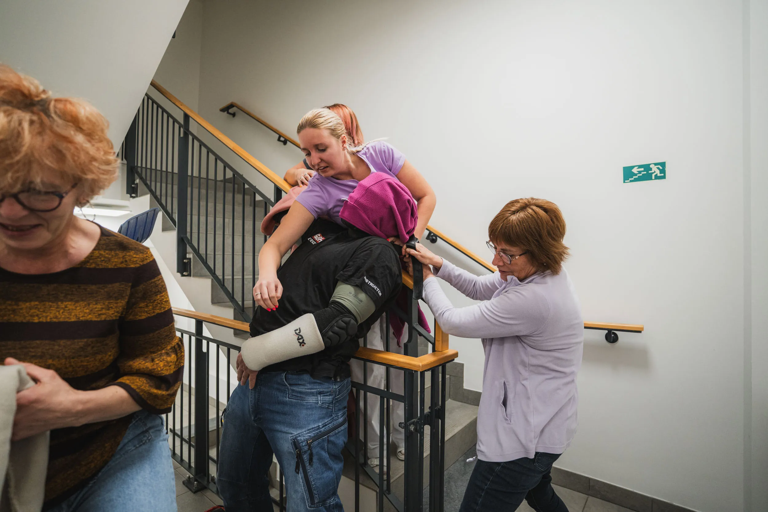 Model crisis situation with participants on the staircase